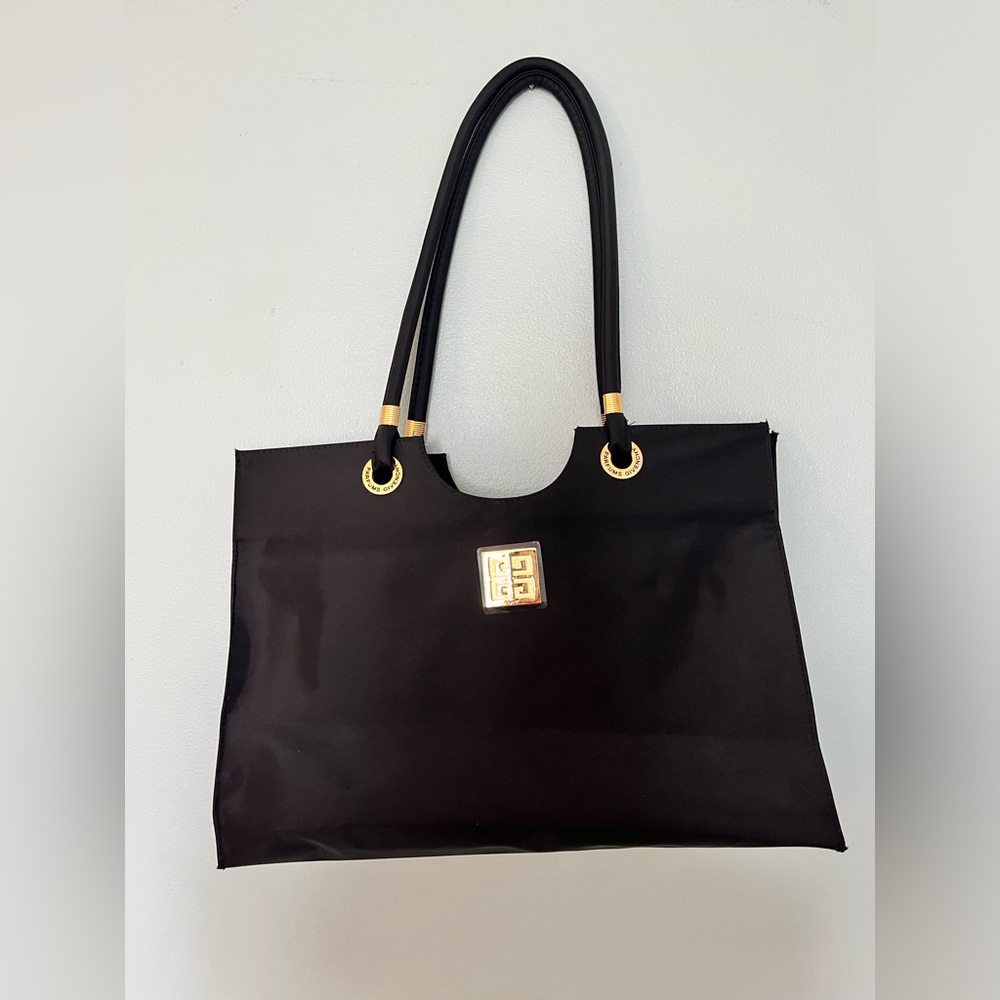 Beautiful Givenchy tote bag that still has protective plastic